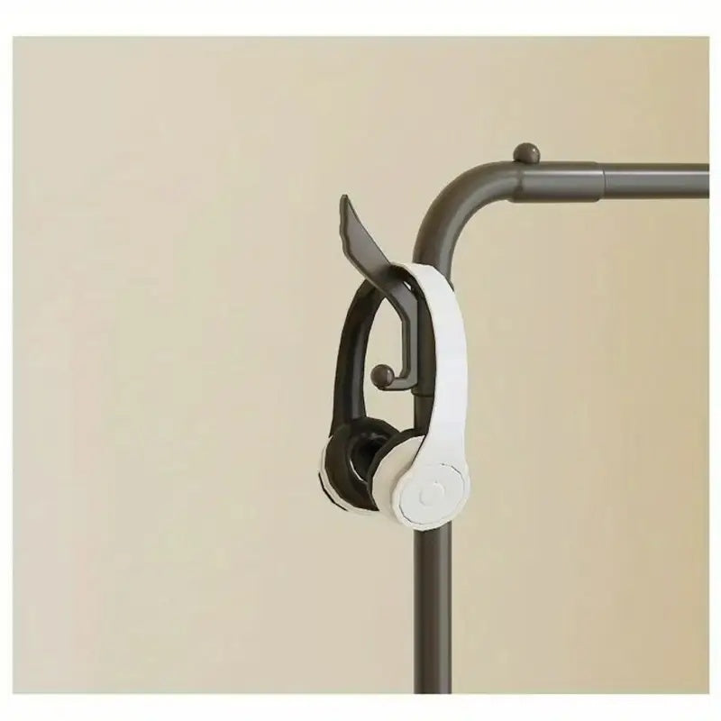 A Coat Rack With Multi-functional Partitions, Available In Black And White, Features Double Hanging Areas. Can Be Delivered To All European Countries. Please Contact Our Customer Service