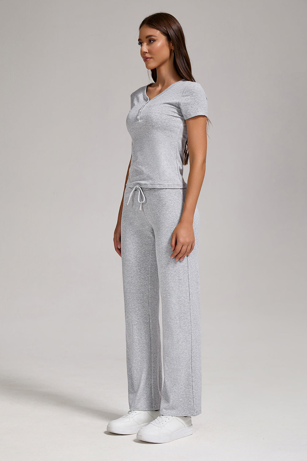 Women's Casual Sports Two-piece Set With V-neck Button, Short Sleeved, Low Waisted Flared Pants, Sportswear