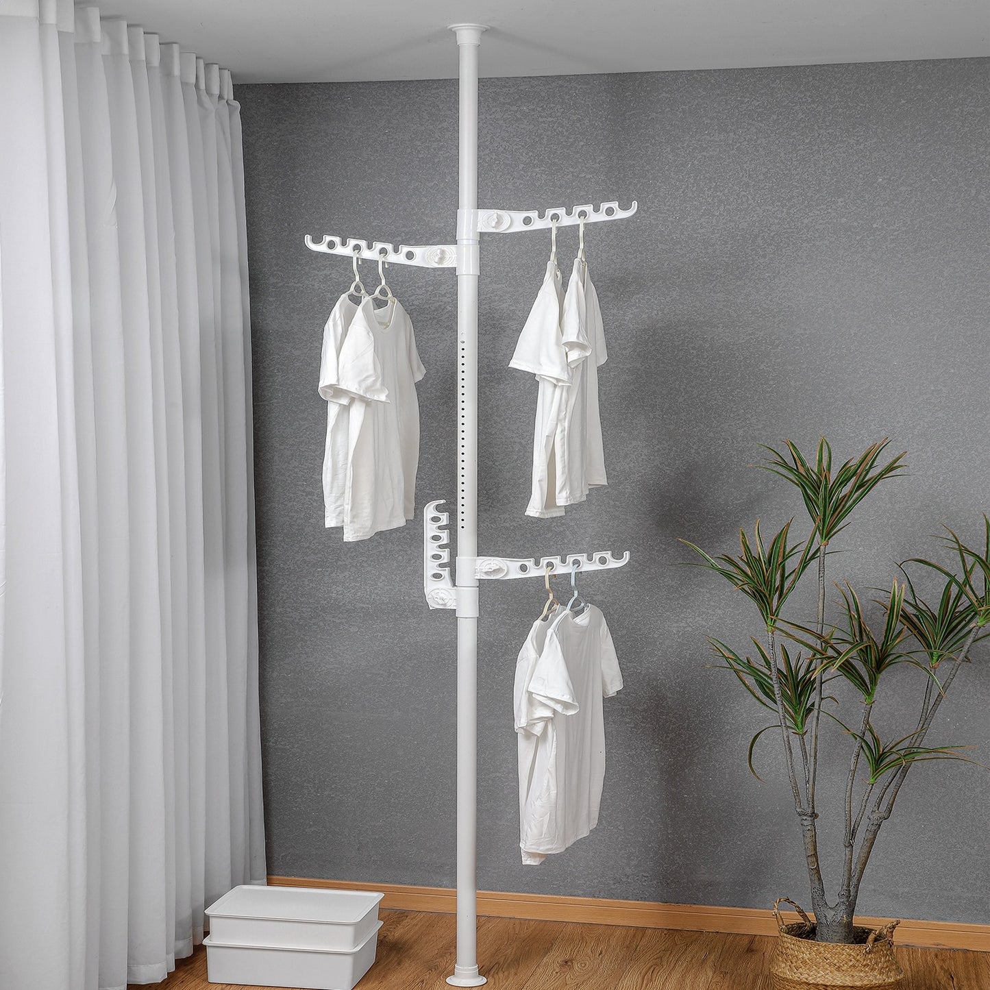 Extra Long Clothes Hanger With The Top Relying On The Ceiling And Nuclear Floor